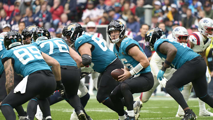 Oct 20, 2024; London, United Kingdom; Jacksonville Jaguars quarterback Trevor Lawrence (16) with the ball in the second half during an NFL International Series game at Wembley Stadium. 