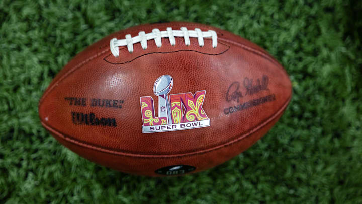 Detailed view of the Super Bowl logo on an official Wilson NFL football 