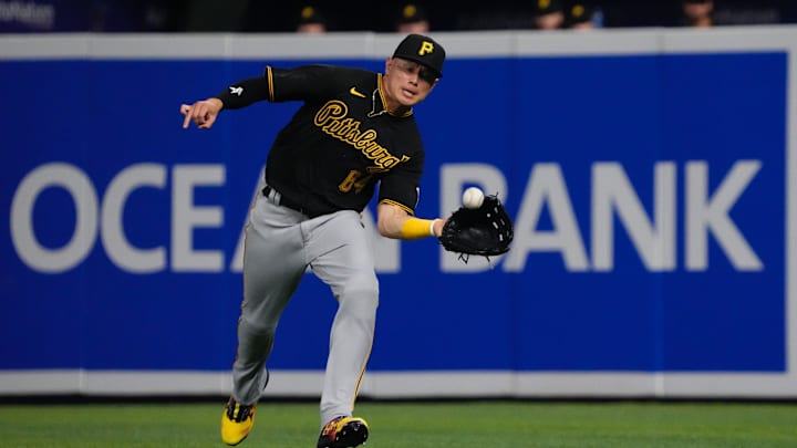 Jul 11, 2022; Miami, Florida, USA; Pittsburgh Pirates right fielder Diego Castillo (64) makes a catch during a game against the Miami Marlins