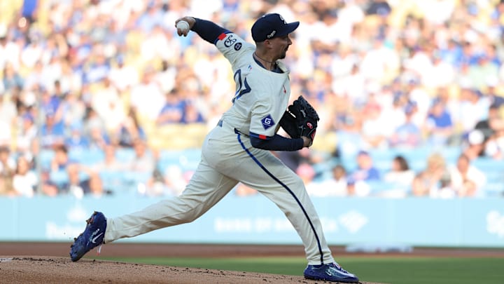 Aug 9, 2025; Los Angeles, California, USA; Los Angeles Dodgers pitcher Blake Snell (7) throws pitch against the Toronto Blue Jays during the first inning at Dodger Stadium. Mandatory Credit: Kiyoshi Mio-Imagn Images