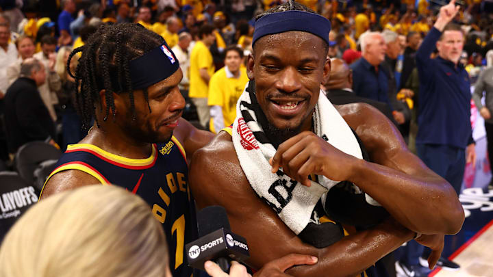 Apr 28, 2025; San Francisco, California, USA; Golden State Warriors guard Buddy Hield (7) celebrates with forward Jimmy Butler III (10) as he speaks to TNT after the game four of the 2025 NBA Playoffs first round against the Houston Rockets at Chase Center. Mandatory Credit: Kelley L Cox-Imagn Images Apr 28, 2025; San Francisco, California, USA; Golden State Warriors guard Buddy Hield (7) celebrates with forward Jimmy Butler III (10) as he speaks to TNT after the game four of the 2025 NBA Playoffs first round against the Houston Rockets at Chase Center. Mandatory Credit: Kelley L Cox-Imagn Images