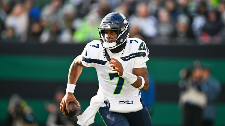 Seattle Seahawks quarterback Geno Smith with the ball during the first quarter against the New York Jets. Seattle Seahawks quarterback Geno Smith with the ball during the first quarter against the New York Jets.