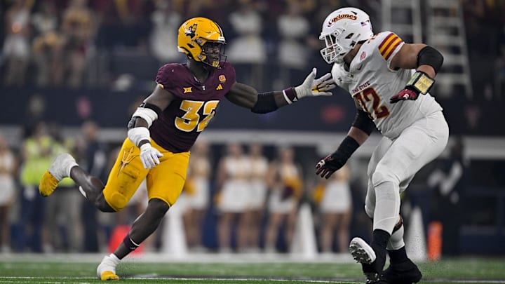 Dec 7, 2024; Arlington, TX, USA; Arizona State Sun Devils defensive lineman Prince Dorbah (32) and Iowa State Cyclones offensive lineman Jalen Travis (72) in action during the game between the Iowa State Cyclones and the Arizona State Sun Devils at AT&T Stadium. Mandatory Credit: Jerome Miron-Imagn Images