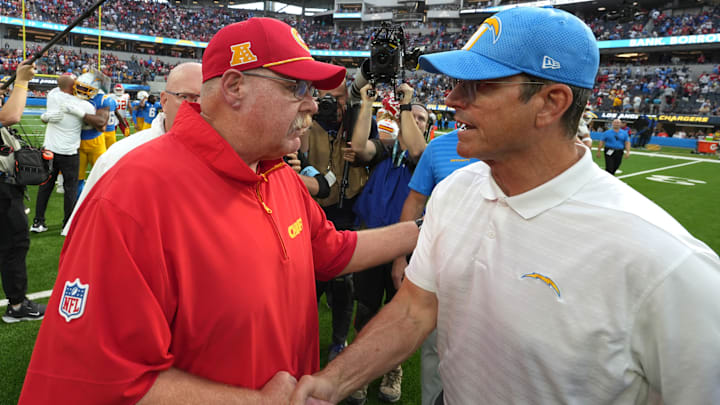 Sep 29, 2024; Inglewood, California, USA; Kansas City Chiefs coach Andy Reid shakes hands with Los Angeles Chargers coach Jim Harbaugh after the game at SoFi Stadium. Mandatory Credit: Kirby Lee-Imagn Images