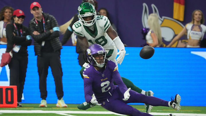 Minnesota Vikings cornerback Stephon Gilmore (2) intercepts a pass intended for New York Jets wide receiver Mike Williams (18) in the fourth quarter at Tottenham Hotspur Stadium in London on Oct. 6, 2024.