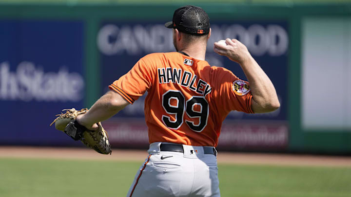 Mar 9, 2023; Clearwater, Florida, USA; Baltimore Orioles catcher Maverick Handley (99) warms up pregame at BayCare Ballpark. Mandatory Credit: Dave Nelson-Imagn Images