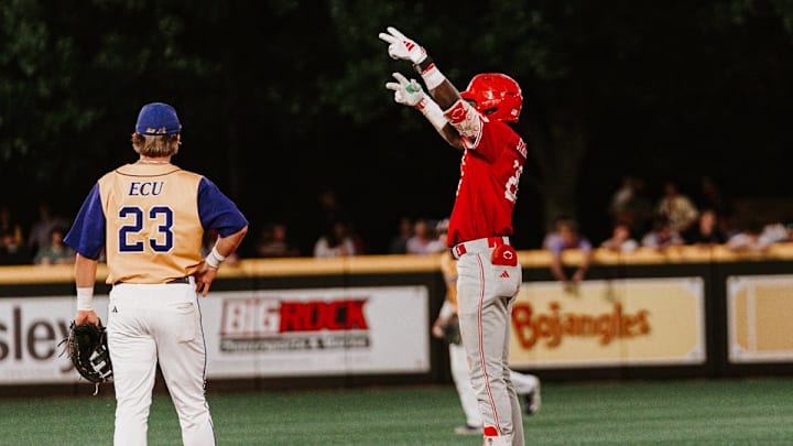 Third Baseman Sherman Johnson celebrates a double on second base during NC State's 10-3 win over East Carolina in Greenville, N.C., on April 14, 2026. Third Baseman Sherman Johnson celebrates a double on second base during NC State's 10-3 win over East Carolina in Greenville, N.C., on April 14, 2026.