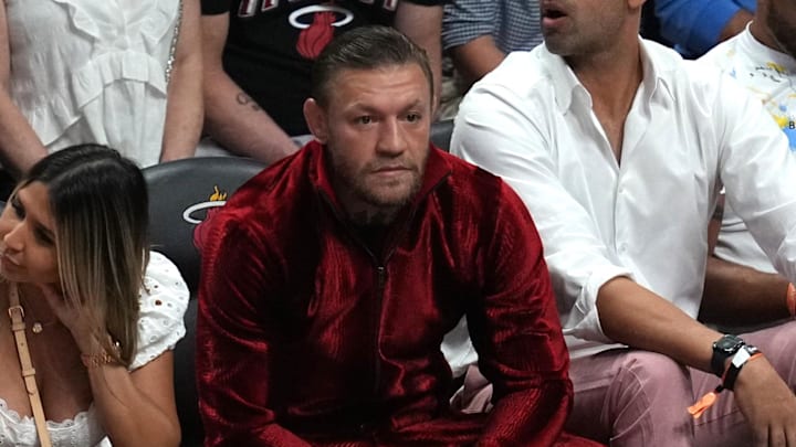 Jun 9, 2023; Miami, Florida, USA; Irish mixed martial artist Conor McGregor looks on during the first half in game four of the 2023 NBA Finals between the Miami Heat and the Denver Nuggets at Kaseya Center. Mandatory Credit: Jim Rassol-Imagn Images Jun 9, 2023; Miami, Florida, USA; Irish mixed martial artist Conor McGregor looks on during the first half in game four of the 2023 NBA Finals between the Miami Heat and the Denver Nuggets at Kaseya Center. Mandatory Credit: Jim Rassol-Imagn Images