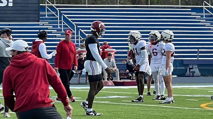 Kalen DeBoer, Jalen Milroe and some of Alabama's wide receivers at practice in Tampa- Dec. 27, 2024