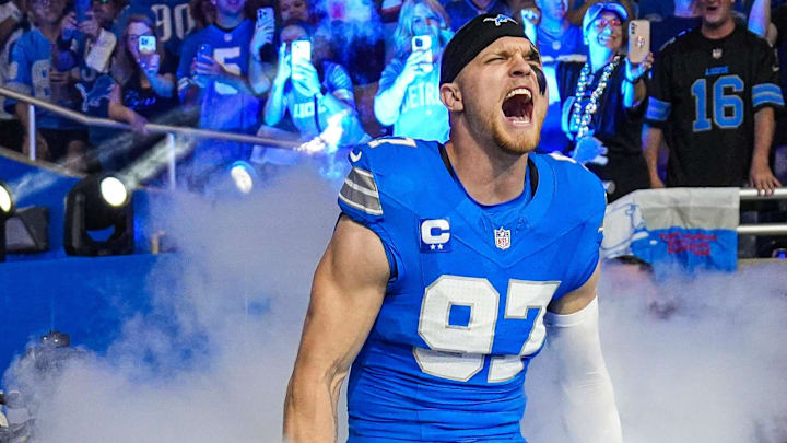 Detroit Lions defensive end Aidan Hutchinson (97) takes the field during players introduction before the Cleveland Browns game at Ford Field in Detroit on Sunday, Sept. 28, 2025. Detroit Lions defensive end Aidan Hutchinson (97) takes the field during players introduction before the Cleveland Browns game at Ford Field in Detroit on Sunday, Sept. 28, 2025.