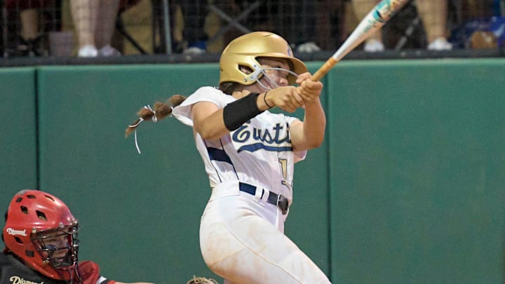 Eustis’ Kendall Kemp (14) bats in a runner for the win during the Class 4A state softball championship game between Eustis High School and Baker County High School at Legends Way Ballfields in Clermont on Thursday, May 23, 2024. [PAUL RYAN / CORRESPONDENT]