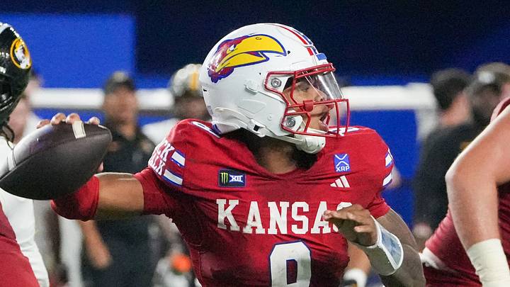 Sep 11, 2026; Lawrence, Kansas, USA; Kansas Jayhawks quarterback Isaiah Marshall (8) throws a pass against the Missouri Tigers during the second half of the game at David Booth Kansas Memorial Stadium. Mandatory Credit: Denny Medley-Imagn Images Sep 11, 2026; Lawrence, Kansas, USA; Kansas Jayhawks quarterback Isaiah Marshall (8) throws a pass against the Missouri Tigers during the second half of the game at David Booth Kansas Memorial Stadium. Mandatory Credit: Denny Medley-Imagn Images
