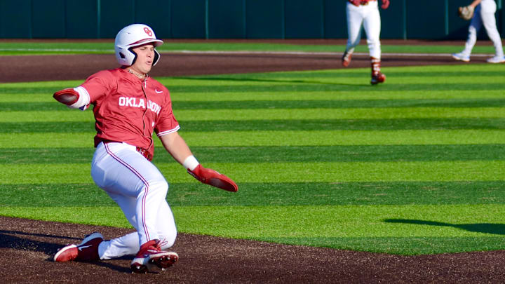 Oklahoma infielder Jaxon Willits slides into third base against Florida.