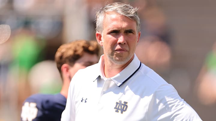 Notre Dame QB coach Gino Guidugli watches practice