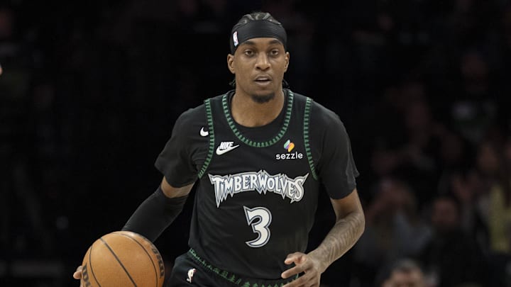 Apr 30, 2026; Minneapolis, Minnesota, USA; Minnesota Timberwolves forward Jaden McDaniels (3) dribbles the ball against the Denver Nuggets in the first half during game six of the first round of the 2026 NBA Playoffs at Target Center. Mandatory Credit: Jesse Johnson-Imagn Images