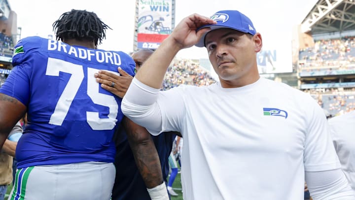 Seattle Seahawks head coach Mike Macdonald walks to the locker room following a victory against the Denver Broncos at Lumen Field. 