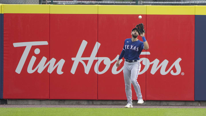 Jul 18, 2021; Buffalo, New York, CAN; Texas Rangers right fielder Joey Gallo (13) catches a fly ball hit by Toronto Blue Jays second baseman Marcus Semien (10) (not pictured) during the third inning at Sahlen Field. Gregory Fisher-Imagn Images Jul 18, 2021; Buffalo, New York, CAN; Texas Rangers right fielder Joey Gallo (13) catches a fly ball hit by Toronto Blue Jays second baseman Marcus Semien (10) (not pictured) during the third inning at Sahlen Field. Gregory Fisher-Imagn Images