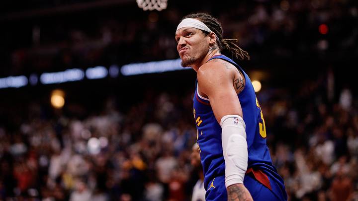 Nov 7, 2025; Denver, Colorado, USA; Denver Nuggets forward Aaron Gordon (32) reacts after a play in the third quarter against the Golden State Warriors at Ball Arena. Mandatory Credit: Isaiah J. Downing-Imagn Images