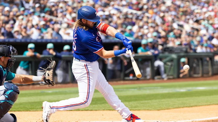 Mar 18, 2024; Surprise, Arizona, USA; Texas Rangers third baseman Davis Wendzel against the Seattle Mariners during a spring training baseball game at Surprise Stadium. Mandatory Credit: Mark J. Rebilas-USA TODAY Sports