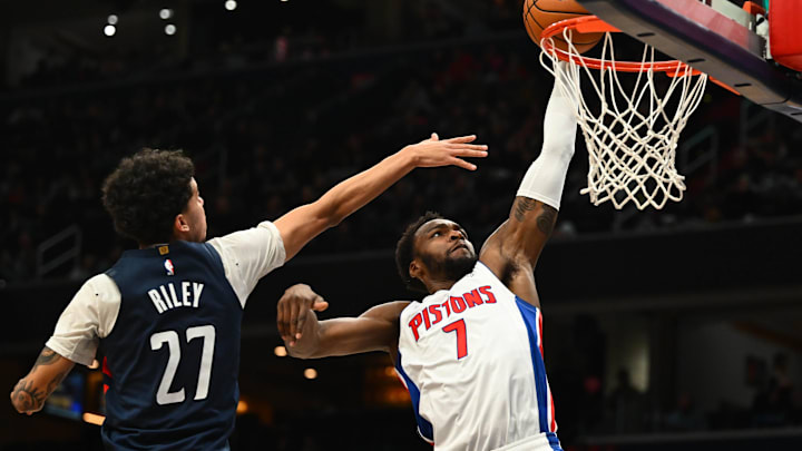 Mar 19, 2026; Washington, District of Columbia, USA; Detroit Pistons forward Paul Reed (7) dunks as Washington Wizards guard Will Riley (27) defends during the first half at Capital One Arena. Mandatory Credit: Brad Mills-Imagn Images