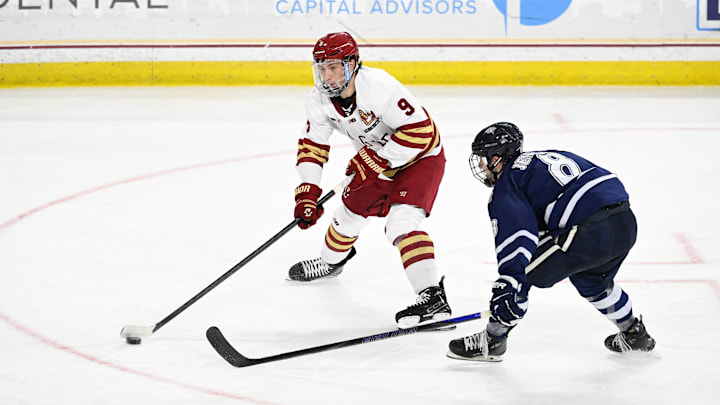 Boston College forward Ryan Leonard shoots the puck against New Hampshire Boston College forward Ryan Leonard shoots the puck against New Hampshire
