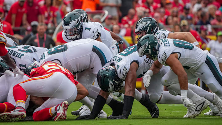 Sep 14, 2025; Kansas City, Missouri, USA; Philadelphia Eagles quarterback Jalen Hurts (1) runs the ball against the Kansas City Chiefs during the game at GEHA Field at Arrowhead Stadium. Mandatory Credit: Denny Medley-Imagn Images