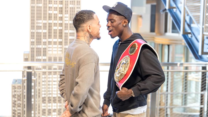 George Kambosos Jr. (left) stares down Richardson Hitchins (right)