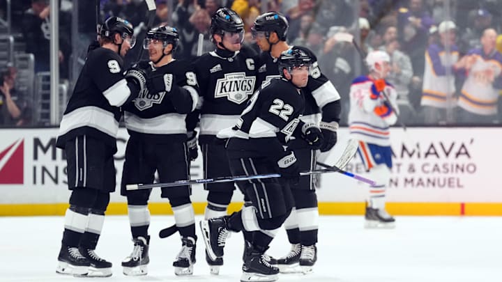 Apr 21, 2025; Los Angeles, California, USA; LA Kings left wing Kevin Fiala (22) celebrates with teammates after scoring a goal in the third period of game one of the first round of the 2025 Stanley Cup Playoffs against the Edmonton Oilers at Crypto.com Arena. Mandatory Credit: Kirby Lee-Imagn Images