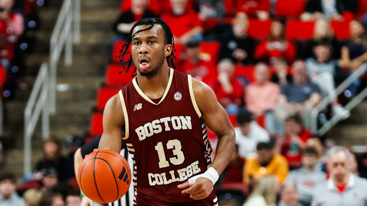 Feb 15, 2025; Raleigh, North Carolina, USA; Boston College Eagles guard Donald Hand Jr. (13) dribbles with the ball during the second half of the game against North Carolina State Wolfpack at Lenovo Center. Mandatory Credit: Jaylynn Nash-Imagn Images