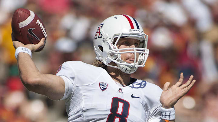 Oct 1, 2011; Los Angeles, CA, USA; FILE PHOTO; Arizona Wildcats quarterback Nick Foles (8) looks to throw against the Southern California Trojans at the Los Angeles Memorial Coliseum. Mandatory Credit: Peter Brouilet-USA TODAY NETWORK