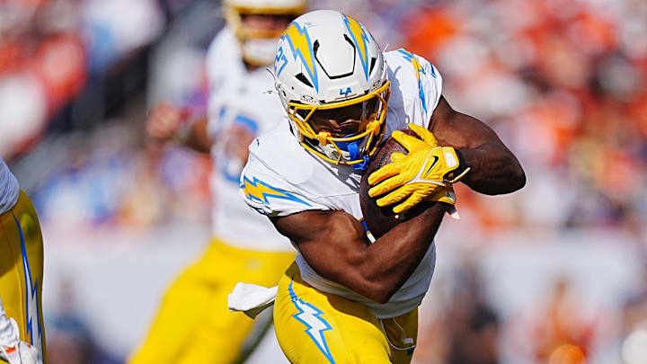 Oct 13, 2024; Denver, Colorado, USA; Los Angeles Chargers running back J.K. Dobbins (27) carries the ball in the second quarter against the Denver Broncos at Empower Field at Mile High. Mandatory Credit: Ron Chenoy-Imagn Images Oct 13, 2024; Denver, Colorado, USA; Los Angeles Chargers running back J.K. Dobbins (27) carries the ball in the second quarter against the Denver Broncos at Empower Field at Mile High. Mandatory Credit: Ron Chenoy-Imagn Images