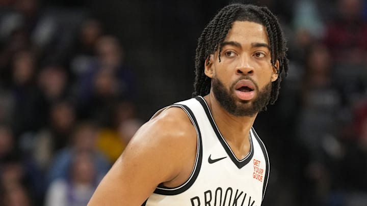 Nov 24, 2024; Sacramento, California, USA; Brooklyn Nets forward Trendon Watford (9) dribbles against the Sacramento Kings during the second quarter at Golden 1 Center. Mandatory Credit: Darren Yamashita-Imagn Images