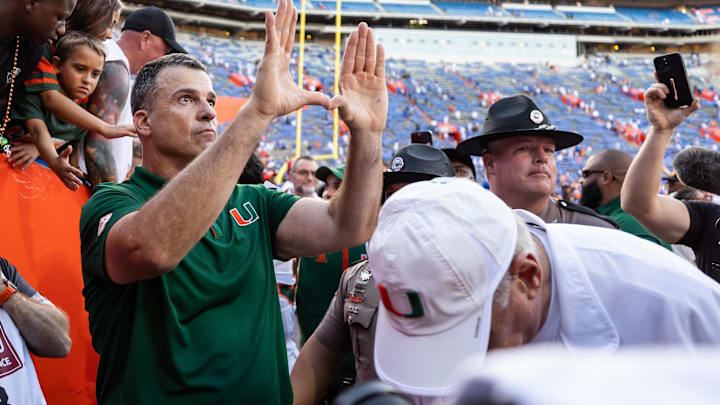 Aug 31, 2024; Gainesville, Florida, USA; Miami Hurricanes head coach Mario Cristobal gestures after a game against the Florida Gators at Ben Hill Griffin Stadium. Mandatory Credit: Matt Pendleton-Imagn Images Aug 31, 2024; Gainesville, Florida, USA; Miami Hurricanes head coach Mario Cristobal gestures after a game against the Florida Gators at Ben Hill Griffin Stadium. Mandatory Credit: Matt Pendleton-Imagn Images
