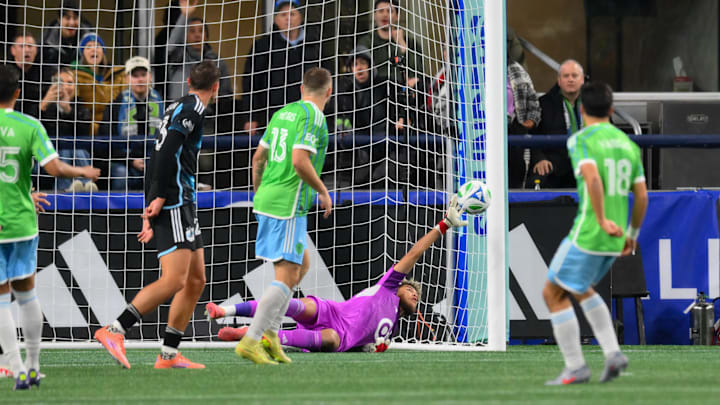 Nov 3, 2025; Seattle, Washington, USA; Minnesota United goalkeeper Dayne St. Clair (97) misses a goal shot by Seattle Sounders FC midfielder Obed Vargas (18) during the second half at Lumen Field. Mandatory Credit: Steven Bisig-Imagn Images Nov 3, 2025; Seattle, Washington, USA; Minnesota United goalkeeper Dayne St. Clair (97) misses a goal shot by Seattle Sounders FC midfielder Obed Vargas (18) during the second half at Lumen Field. Mandatory Credit: Steven Bisig-Imagn Images