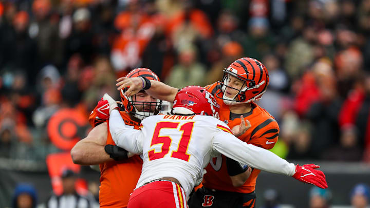 Jan 2, 2022; Cincinnati, Ohio, USA; Cincinnati Bengals quarterback Joe Burrow (9) throws a pass against Kansas City Chiefs defensive end Michael Danna (51) in the second half at Paul Brown Stadium. Mandatory Credit: Katie Stratman-Imagn Images