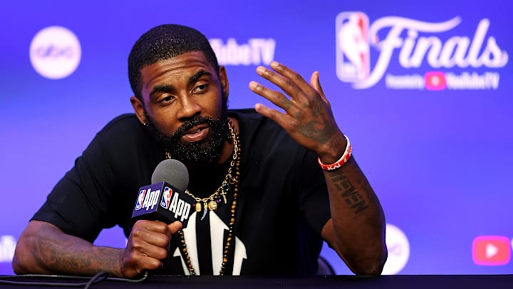 Dallas Mavericks guard Kyrie Irving (11) during the NBA Finals Media Day at TD Garden. 