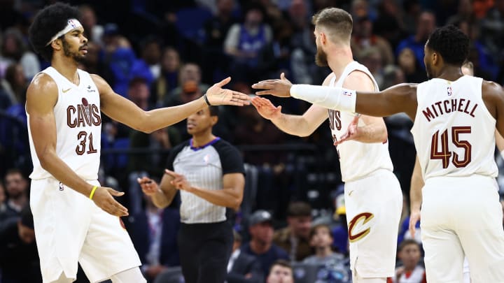 Jan 22, 2024; Orlando, Florida, USA; Cleveland Cavaliers center Jarrett Allen (31), guard Donovan Mitchell (45) and forward Dean Wade (32) celebrate against the Orlando Magic during the second half at Kia Center. Mandatory Credit: Kim Klement Neitzel-USA TODAY Sports Jan 22, 2024; Orlando, Florida, USA; Cleveland Cavaliers center Jarrett Allen (31), guard Donovan Mitchell (45) and forward Dean Wade (32) celebrate against the Orlando Magic during the second half at Kia Center. Mandatory Credit: Kim Klement Neitzel-USA TODAY Sports