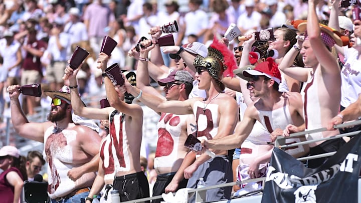 Mississippi State Bulldogs fans cheer during the second quarter against the Florida Gators at Davis Wade Stadium at Scott Field. Mississippi State Bulldogs fans cheer during the second quarter against the Florida Gators at Davis Wade Stadium at Scott Field.