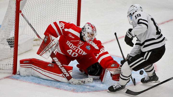 Apr 12, 2025; St. Louis, Missouri: Boston University Terriers goaltender Mikhail Yegorov defends against Western Michigan Broncos forward Cam Knuble (19) during the second period of the Frozen Four national championship at Enterprise Center.