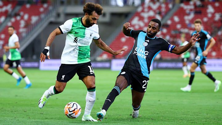 Mohamed Salah (left) gave Ricardo Pereira a torrid time in Singapore