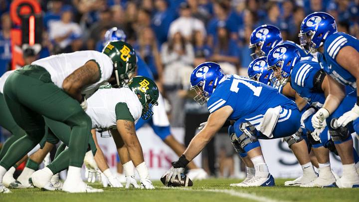 Sep 10, 2022; Provo, Utah, USA; Brigham Young Cougars offensive lineman Blake Freeland (71) prepares to snap the ball in the second half against the Baylor Bears at LaVell Edwards Stadium. Mandatory Credit: Gabriel Mayberry-Imagn Images Sep 10, 2022; Provo, Utah, USA; Brigham Young Cougars offensive lineman Blake Freeland (71) prepares to snap the ball in the second half against the Baylor Bears at LaVell Edwards Stadium. Mandatory Credit: Gabriel Mayberry-Imagn Images
