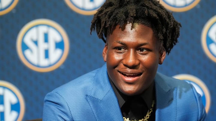 Texas star Anthony Hill Jr. smiles as he answers questions during SEC Media Days 