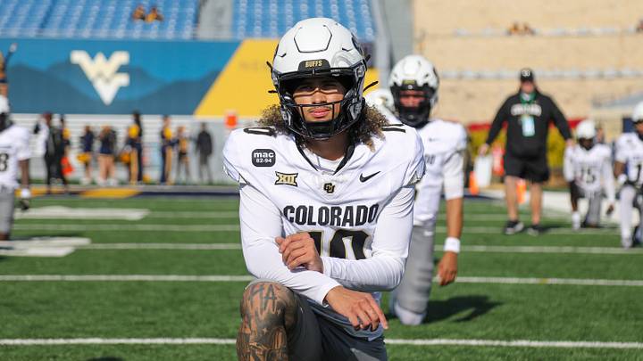 Nov 8, 2025; Morgantown, West Virginia, USA; Colorado Buffaloes quarterback Julian Lewis (10) warms up prior to their game against the West Virginia Mountaineers at Milan Puskar Stadium. Mandatory Credit: Ben Queen-Imagn Images