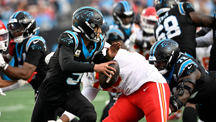 Nov 24, 2024; Charlotte, North Carolina, USA; Carolina Panthers quarterback Bryce Young (9) scrambles in the fourth quarter at Bank of America Stadium. Mandatory Credit: Bob Donnan-Imagn Images