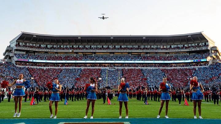Planes fly over before a college football game between Ole Miss and LSU at Vaught-Hemingway Stadium in Oxford, Miss. Planes fly over before a college football game between Ole Miss and LSU at Vaught-Hemingway Stadium in Oxford, Miss.