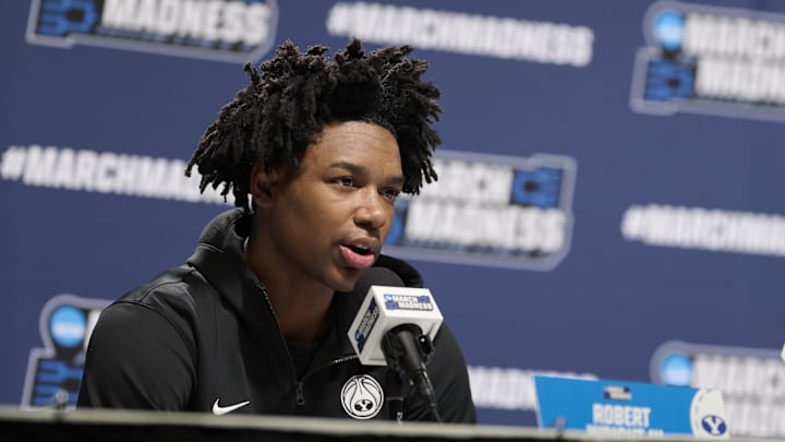 Mar 18, 2026; Portland, OR, USA; BYU Cougars guard Robert Wright III (1) answers a question during a press conference before a practice session ahead of the first round of the men's 2026 NCAA Tournament at Moda Center. Mandatory Credit: Troy Wayrynen-Imagn Images