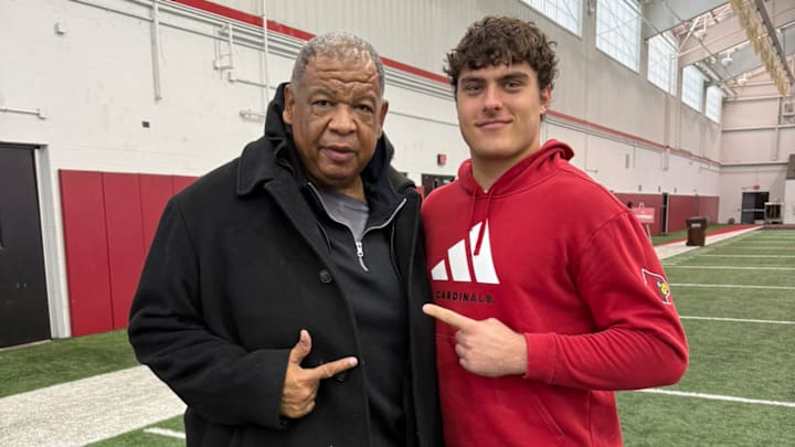 Louisville Executive Director of Football Personnel and Recruiting Vince Marrow and Louisville (Ky.) Trinity defensive lineman Sebastian Blue