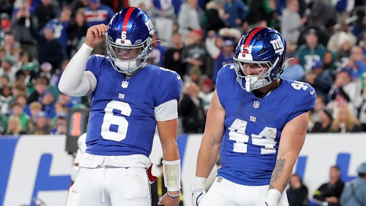 Oct 9, 2025; East Rutherford, New Jersey, USA; New York Giants quarterback Jaxson Dart (6) and running back Cam Skattebo (44) celebrate Skattebo's touchdown against the Philadelphia Eagles during the second quarter at MetLife Stadium. Mandatory Credit: Brad Penner-Imagn Images