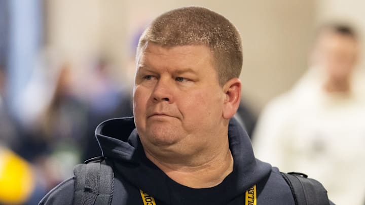 Jan 8, 2024; Houston, TX, USA; Washington Huskies strength and conditioning coach Ron McKeefery against the Michigan Wolverines during the 2024 College Football Playoff national championship game at NRG Stadium. Mandatory Credit: Mark J. Rebilas-Imagn Images