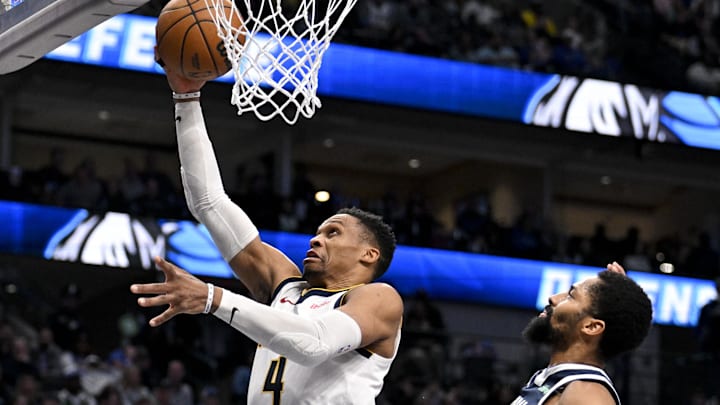 Jan 12, 2025; Dallas, Texas, USA; Denver Nuggets guard Russell Westbrook (4) drives to the basket past Dallas Mavericks guard Spencer Dinwiddie (26) during the second half at the American Airlines Center. Mandatory Credit: Jerome Miron-Imagn Images Jan 12, 2025; Dallas, Texas, USA; Denver Nuggets guard Russell Westbrook (4) drives to the basket past Dallas Mavericks guard Spencer Dinwiddie (26) during the second half at the American Airlines Center. Mandatory Credit: Jerome Miron-Imagn Images